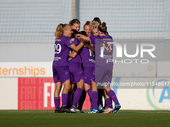 Stefania Vatafu (center number 10 partially hidden) of Anderlecht is celebrated by her teammates after scoring the 1-0 goal for her team dur...