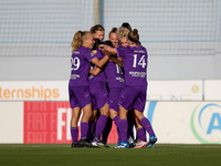 Stefania Vatafu (center number 10 partially hidden) of Anderlecht is celebrated by her teammates after scoring the 1-0 goal for her team dur...