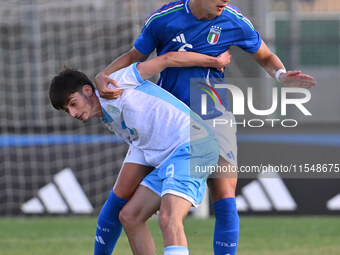 Marco Gasperoni (SMR) and Daniele Ghilardi (ITA) during the UEFA U21 Euro 2025 Qualifier match between Italy and San Marino at the Domenico...