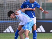 Marco Gasperoni (SMR) and Daniele Ghilardi (ITA) during the UEFA U21 Euro 2025 Qualifier match between Italy and San Marino at the Domenico...