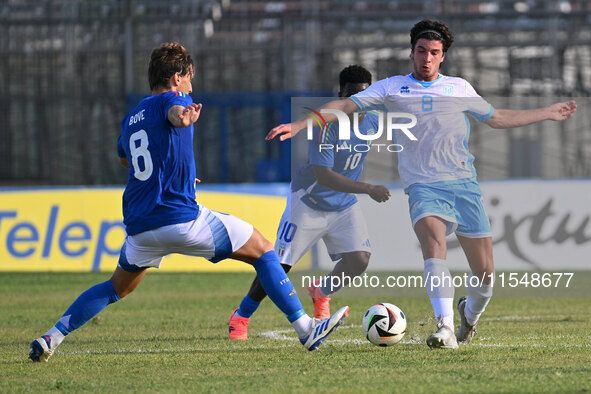 Edoardo Bove (ITA) and Alberto Tomassini (SMR) during the UEFA U21 Euro 2025 Qualifier match between Italy and San Marino at the Domenico Fr...