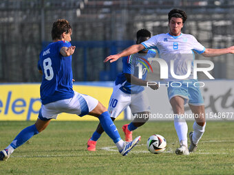 Edoardo Bove (ITA) and Alberto Tomassini (SMR) during the UEFA U21 Euro 2025 Qualifier match between Italy and San Marino at the Domenico Fr...