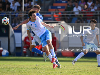 Matteo Guidi (SMR) and Pio Esposito (ITA) during the UEFA U21 Euro 2025 Qualifier match between Italy and San Marino at the Domenico Francio...