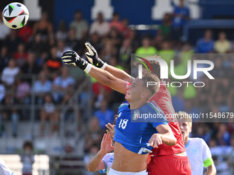 Pio Esposito (ITA) and Pietro Amici (SMR) participate in the UEFA U21 Euro 2025 Qualifier match between Italy and San Marino at the Domenico...