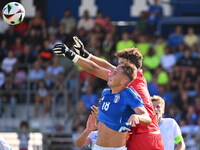 Pio Esposito (ITA) and Pietro Amici (SMR) participate in the UEFA U21 Euro 2025 Qualifier match between Italy and San Marino at the Domenico...