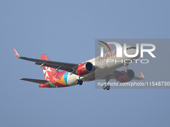 A KM Malta Airlines 9H-NEC KM Airbus flies over the match venue during the UEFA Women's Champions League First qualifying round, Semi-finals...