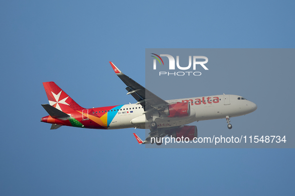 A KM Malta Airlines 9H-NEC KM Airbus flies over the match venue during the UEFA Women's Champions League First qualifying round, Semi-finals...