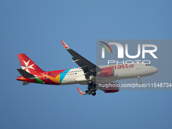 A KM Malta Airlines 9H-NEC KM Airbus flies over the match venue during the UEFA Women's Champions League First qualifying round, Semi-finals...