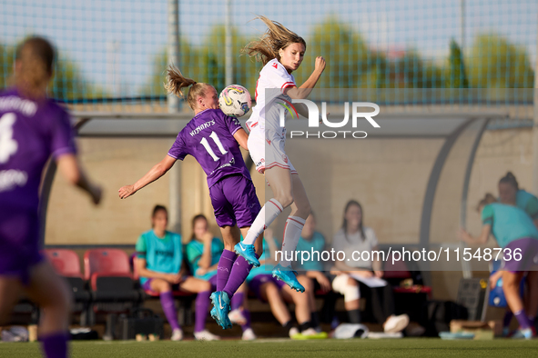 Sofija Sremcevic of Crvena Zvezda competes for the ball with Sarah Wijnants of Anderlecht during the UEFA Women's Champions League First qua...