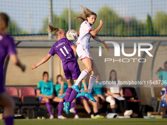 Sofija Sremcevic of Crvena Zvezda competes for the ball with Sarah Wijnants of Anderlecht during the UEFA Women's Champions League First qua...