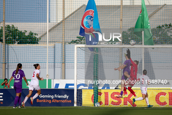 Amelie Delabre of Anderlecht competes for the ball with Roksana Shahanska, goalkeeper of Crvena Zvezda, during the UEFA Women's Champions Le...