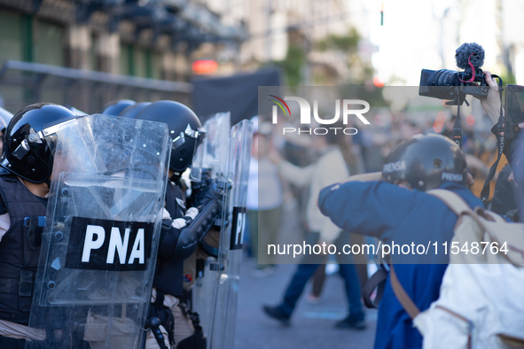 Retirees, social organizations, and unions mobilize in front of the National Congress of the Republic of Argentina in Buenos Aires, Argentin...