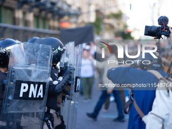 Retirees, social organizations, and unions mobilize in front of the National Congress of the Republic of Argentina in Buenos Aires, Argentin...