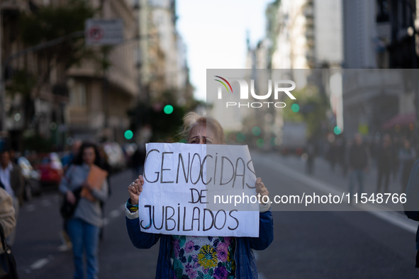 Retirees, social organizations, and unions mobilize in front of the National Congress of the Republic of Argentina in Buenos Aires, Argentin...