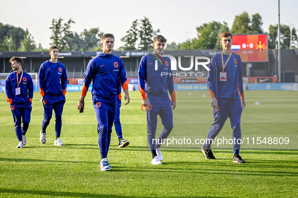 Netherlands player Calvin Raatsie, Netherlands player Youri Regeer, and Netherlands player Robin Roefs during the match between the Netherla...