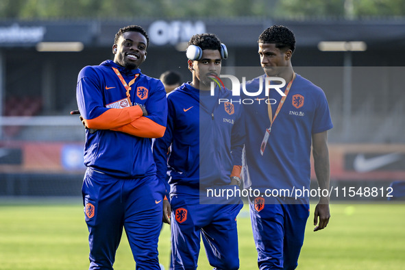 Netherlands player Noah Ohio, Netherlands player Ian Maatsen, and Netherlands player Ryan Flamingo during the match between the Netherlands...