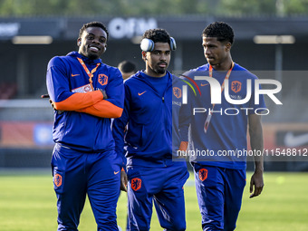 Netherlands player Noah Ohio, Netherlands player Ian Maatsen, and Netherlands player Ryan Flamingo during the match between the Netherlands...