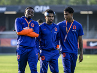 Netherlands player Noah Ohio, Netherlands player Ian Maatsen, and Netherlands player Ryan Flamingo during the match between the Netherlands...