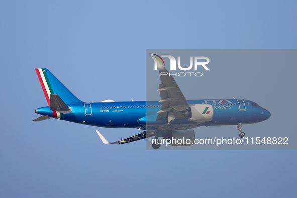 The ITA Airways EI-HOB Airbus A320 flies over the match venue during the UEFA Women's Champions League First qualifying round, Semi-finals C...