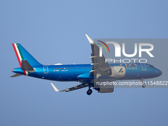 The ITA Airways EI-HOB Airbus A320 flies over the match venue during the UEFA Women's Champions League First qualifying round, Semi-finals C...