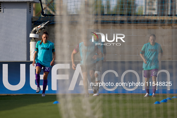 Substitute soccer players from Anderlecht warm up during the UEFA Women's Champions League First qualifying round, Semi-finals CP-Group 4 so...