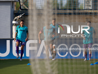 Substitute soccer players from Anderlecht warm up during the UEFA Women's Champions League First qualifying round, Semi-finals CP-Group 4 so...