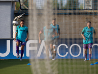 Substitute soccer players from Anderlecht warm up during the UEFA Women's Champions League First qualifying round, Semi-finals CP-Group 4 so...