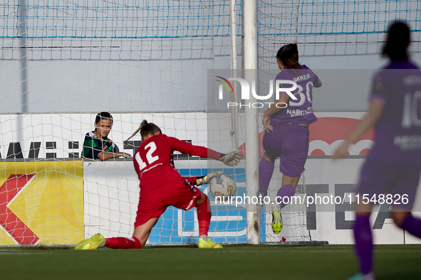 Roksana Shahanska (left), goalkeeper of Crvena Zvezda, saves the ball from a close-range shot by Luna Vanzeir (right) of Anderlecht during t...