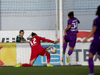 Roksana Shahanska (left), goalkeeper of Crvena Zvezda, saves the ball from a close-range shot by Luna Vanzeir (right) of Anderlecht during t...