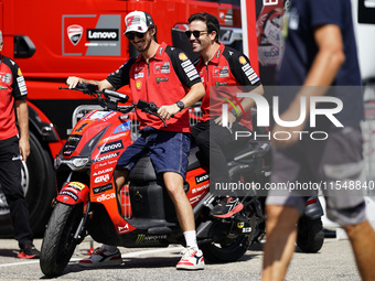 Francesco Bagnaia of Italy and Ducati Lenovo Team drives on the paddock during the preview of the MotoGP of San Marino at Misano World Circu...