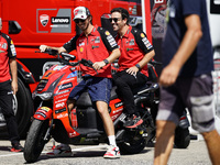 Francesco Bagnaia of Italy and Ducati Lenovo Team drives on the paddock during the preview of the MotoGP of San Marino at Misano World Circu...