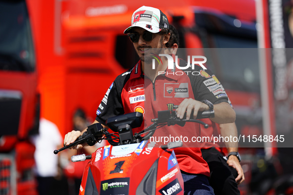 Francesco Bagnaia of Italy and Ducati Lenovo Team drives on the paddock during the preview of the MotoGP of San Marino at Misano World Circu...