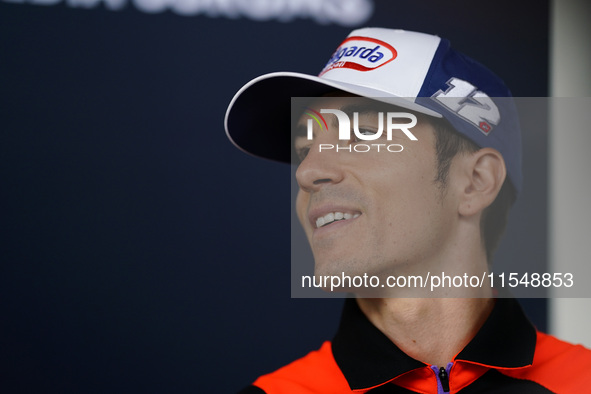 Maverick Vinales of Spain and Aprilia Racing looks on during the presentation press conference of the MotoGP of San Marino at Misano World C...