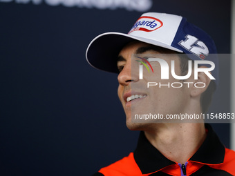 Maverick Vinales of Spain and Aprilia Racing looks on during the presentation press conference of the MotoGP of San Marino at Misano World C...