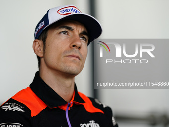 Maverick Vinales of Spain and Aprilia Racing looks on during the presentation press conference of the MotoGP of San Marino at Misano World C...