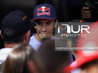 Marc Marquez of Spain and Gresini Racing MotoGP poses with fans during the preview of the MotoGP of San Marino at Misano World Circuit in Mi...