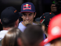 Marc Marquez of Spain and Gresini Racing MotoGP poses with fans during the preview of the MotoGP of San Marino at Misano World Circuit in Mi...