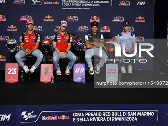 Enea Bastianini of Italy and Ducati Lenovo Team (L), Francesco Bagnaia of Italy and Ducati Lenovo Team (LC), Jorge Martin of Spain and Prima...