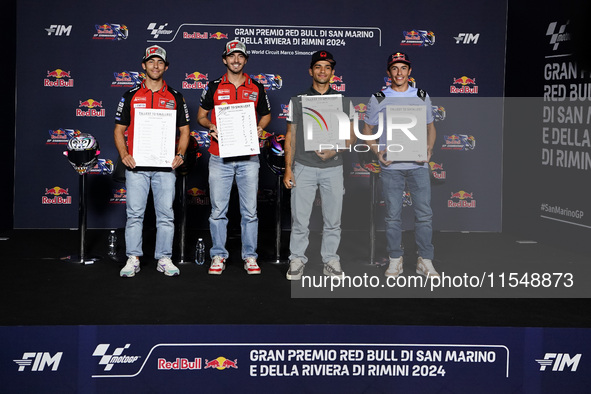 Enea Bastianini of Italy and Ducati Lenovo Team (L), Francesco Bagnaia of Italy and Ducati Lenovo Team (LC), Jorge Martin of Spain and Prima...