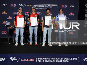 Enea Bastianini of Italy and Ducati Lenovo Team (L), Francesco Bagnaia of Italy and Ducati Lenovo Team (LC), Jorge Martin of Spain and Prima...