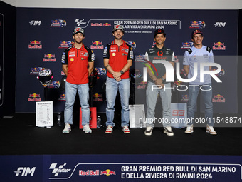 Enea Bastianini of Italy and Ducati Lenovo Team (L), Francesco Bagnaia of Italy and Ducati Lenovo Team (LC), Jorge Martin of Spain and Prima...