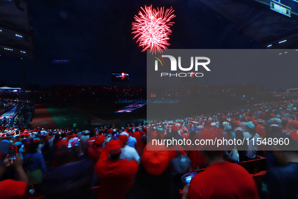 Diablos Rojos fans observe the fireworks before match 1 against Sultanes de Monterrey of the Mexican Baseball League (LMB) Serie del Rey at...