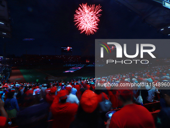 Diablos Rojos fans observe the fireworks before match 1 against Sultanes de Monterrey of the Mexican Baseball League (LMB) Serie del Rey at...