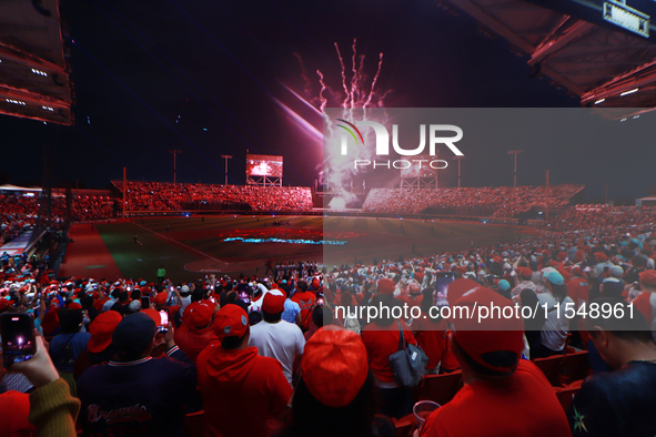 Diablos Rojos fans observe the fireworks before match 1 against Sultanes de Monterrey of the Mexican Baseball League (LMB) Serie del Rey at...