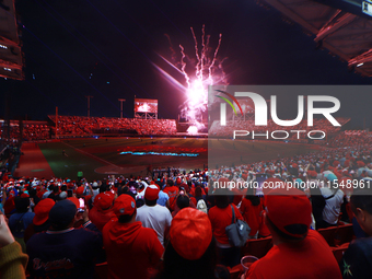 Diablos Rojos fans observe the fireworks before match 1 against Sultanes de Monterrey of the Mexican Baseball League (LMB) Serie del Rey at...