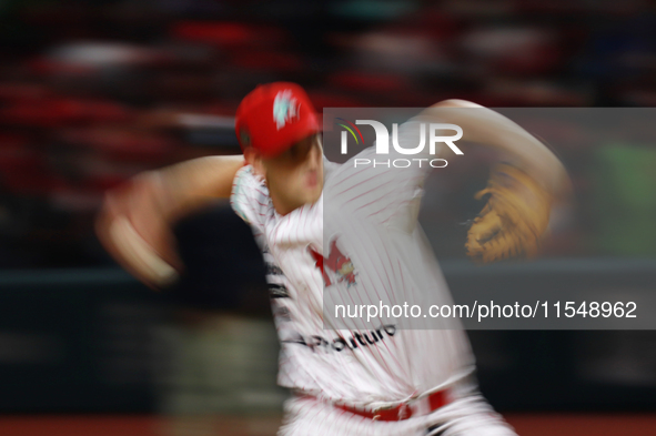 Justin Courtney #13 of Diablos Rojos pitches the ball during match 1 against Sultanes de Monterrey of the Mexican Baseball League (LMB) Seri...