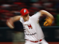 Justin Courtney #13 of Diablos Rojos pitches the ball during match 1 against Sultanes de Monterrey of the Mexican Baseball League (LMB) Seri...