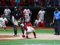 Franklin Barreto #43 of Diablos Rojos slides on the home plate during match 1 against Sultanes de Monterrey of the Mexican Baseball League (...