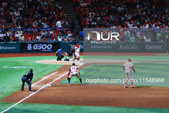 Juan Carlos Gamboa #47 of Diablos Rojos hits the ball during match 1 against Sultanes de Monterrey of the Mexican Baseball League (LMB) Seri...