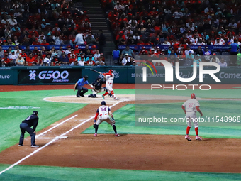 Juan Carlos Gamboa #47 of Diablos Rojos hits the ball during match 1 against Sultanes de Monterrey of the Mexican Baseball League (LMB) Seri...